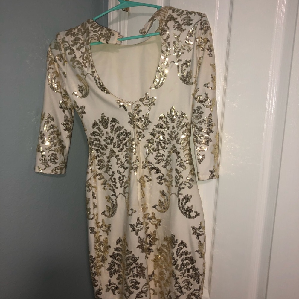 A white and gold stunning dress